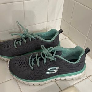 Grey and light green Skechers for women.